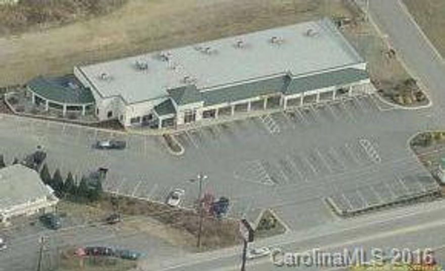 Retail space in Bellagio strip center in Woodfin. Landlord pays taxes, insurance on building, operating expenses, and building maintenance. Tenant pays for utilities and insurance on contents. Available immediately.