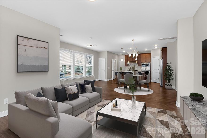 Welcome home to Chadwick Park! Enjoy the natural light in this end-unit townhome, which features 3 bedrooms, 2.5 bathrooms, and a 2-car garage with an extended parking pad. Upgrades include hardwoods on the main level and up the stairs. Freshly painted throughout and new carpet. Frigidaire Professional oversized gas range, oven, dishwasher, and microwave. Stainless Steel Fridge conveys as well. Beautiful quartz countertops, tile backsplash and oversized island. Corner pantry for ample storage. Upstairs is a loft area currently used as a second living room, 2 guest bedrooms, and the primary suite. The laundry room and hookup is also upstairs and oversized as well. Primary Suite features a generous bedroom and walk-in closet. Primary bathroom features dual sinks, quartz countertops, a linen closet, a shower, and a separate water closet. HOA maintains the beautiful landscaping and downtown Pineville is just one block away! Enjoy Waterbean Coffee in the morning on Main Street and wind down after work with a glass of wine at Margaux's Wine, Pizza & market. This townhome is set in a village-like setting with so much downtown charm, yet minutes to all of Uptown Charlotte's culture, Blue Line Light rail/ I-485 Station, airport and major highways.