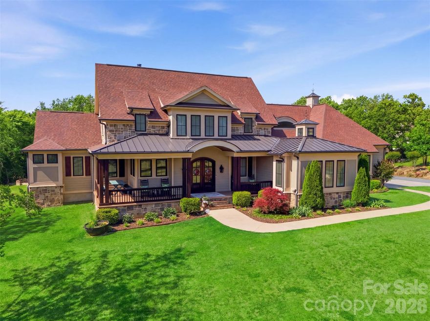 Gracefully situated on 2.69 private acres in a highly sought-after Davidson Equestrian community, this custom-designed two-story modern rustic estate by J.J. Barja offers an exceptional blend of luxury, warmth, and privacy. Designed for both everyday living and effortless entertaining, the home features an open-concept floor plan with a main-level primary suite and an optional second primary suite on the main floor. The chef’s kitchen is a true centerpiece, showcasing a Lacanche Range and two oversized islands ideal for gathering and entertaining. Rich Douglas Fir hardwood floors run throughout the home, adding timeless character and warmth. A spacious bonus retreat features eight custom built-in bunks, creating the ultimate sleepover or guest space. Expansive covered and screened porches seamlessly extend the living areas outdoors, overlooking a salt water pool and serene wooded backdrop for privacy and tranquility.