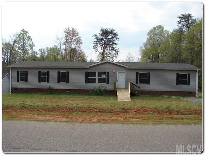 Charming Doublewide in Maiden! Home sits on over a half acre lot with wooded backyard. Spacious and bright interior with open floor plan, large kitchen with breakfast area. Huge master suite with garden tub, walk in closet and dual vanities, secondary bedrooms are also roomy. See Attachments.