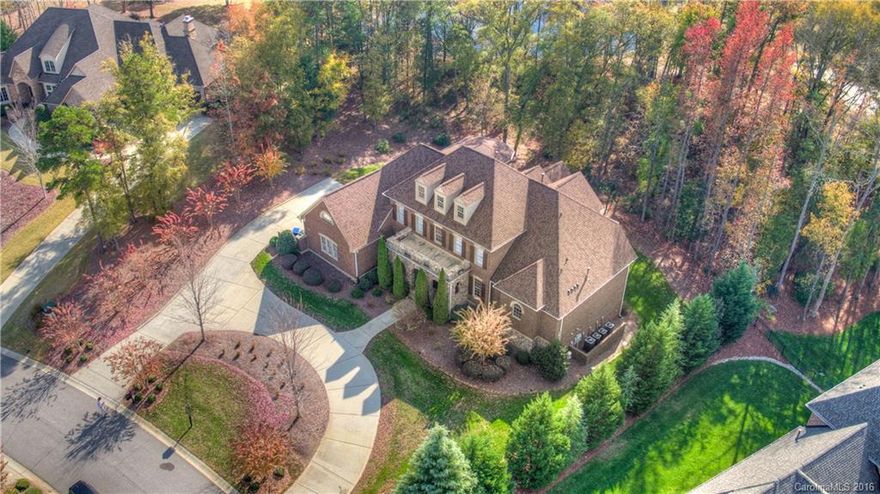 Gracefully proportioned - Effortlessly Luxurious. Incredible entertaining home on manicured .90 acres. Warming natural light, dramatic open spaces and immediate views of 14th hole pull you into the soaring glass-rich great room. Kitchen that seduces the chef in all of us is flanked by gathering room. Spill onto serene screened porch and breathe. Romantic master retreat on main w/ sitting room. Bonus/Media/3 sizable beds up. 2nd living on lower - kitchen, billiards,guest suite,living room.