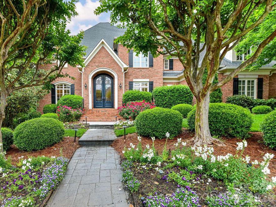 Impressive Ballantyne Country Club home set along the golf course with views of the 18th fairway along the back and from the front, tranquil water view and #17 green. This exceptional residence blends grand scale with effortless everyday living. Designed and built for comfort, the home offers six bedrooms and a thoughtfully designed layout with the primary suite on the main level creating a private retreat with serene views and spa-like appeal. The heart of the home is the expansive kitchen, perfectly appointed with generous workspace, stainless steel appliances, and a large gathering area anchored by a cozy fireplace, ideal for both intimate mornings and lively entertaining. The dramatic two-story great room with fireplace is filled with natural light, showcasing floor-to-ceiling windows that frame the picturesque backyard & golf course. Outdoor living is equally inviting, featuring a beautiful pool, upper terrace for elevated views, and multiple spaces to relax or entertain on the lower patio complete with stone fireplace. The fully finished basement elevates the lifestyle experience with a bar that includes an ice maker and refrigerator and family room with fireplace. In addition you will find a guest room, full bath, office, fitness and flex space. Completing the home is a spacious four-car garage, offering ample room for vehicles, storage, or hobbies. This is a rare opportunity to own a home that seamlessly combines luxury, functionality, and an unbeatable golf course setting.  Golf, Dining, swim, tennis and other club specific amenities requires membership