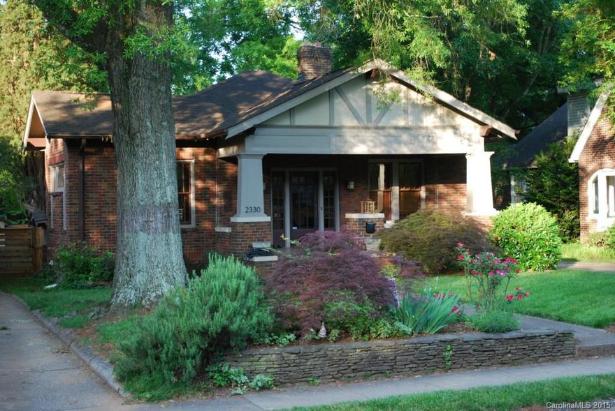 CHARMING BUNGALOW IN SOUGHT AFTER N'HOOD!  VERY WELL MAINTAINED, HIGH CEILINGS, UPDATED BATHS, LARGE KITCHEN WITH PLENTY OF COUNTER SPACE, HARDWOODS, FIREPLACE, DECK. LARGE FRONT PORCH FOR ENTERTAINING!  NICE FLAT LOT WITH GREAT LANDSCAPING, FENCED YARD, "MAN CAVE" !