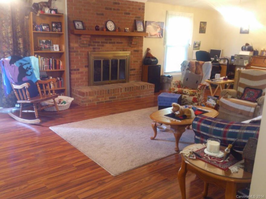 This home shows beautifully just like a model. Painted inside and out. New tile in the bathrooms. Hard wood floors throughout and granite counter top in the kitchen. New disposal and new roof. The heat pump is 8 years old. Fenced in backyard with lovely patio, work shed and deck for entertaining. Spectacular and easy to maintain. Turn key ready for immediate comfort and retreat.