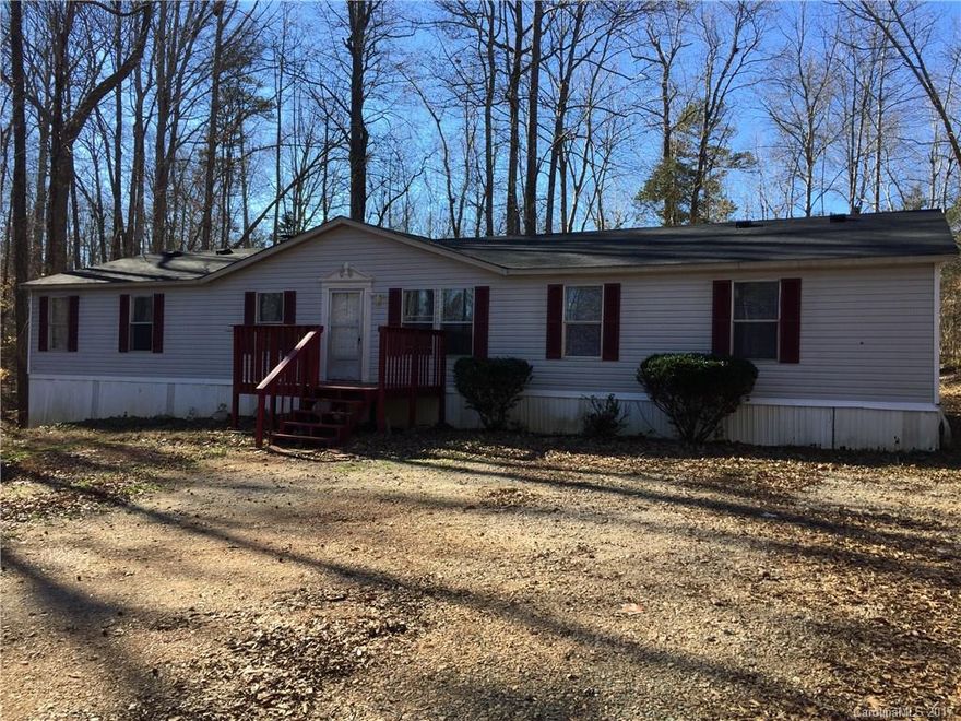 Motivated seller, so submit an offer!  This spacious open floor plan home has 4 bedrooms and 2 full bathrooms on a level, wooded acre of land.  Brand new roof in Dec. 2016.  The established O'Malley's Way community is convenient to Hwy 55 and the new Clover Middle School.  Home is being sold AS IS.  AC does not work.
