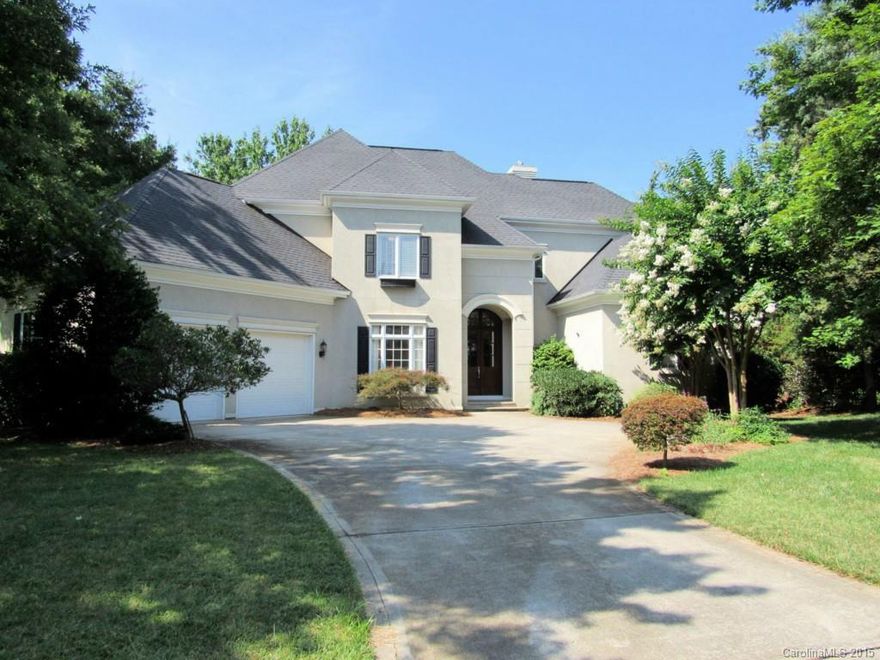 Great value on this 4 bedroom home in Ballantyne Country Club!  Lots of upgrades, hardwood floors, gourmet kitchen, master suite on main level, rear terrace, wooded and fenced back yard and located on a cul-de-sac!