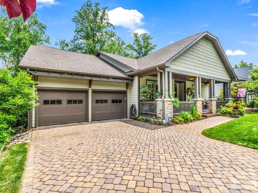 Experience the understated elegance of this immaculate Arts and Crafts home, perfectly located within one of the region’s most coveted residential areas: the scenic Biltmore Lake community! A welcoming covered front porch leads into a thoughtfully designed interior where timeless craftsmanship meets modern comfort. The heart of the home is a spacious great room featuring high ceilings and custom Amish-built cabinetry flanking a floor-to-ceiling stone fireplace. This open-concept space flows into a bright kitchen finished with granite countertops, a marble backsplash, and a large walk-in pantry, while the adjacent dining area provides a comfortable setting for gatherings with its large windows and tasteful finishes.
The primary suite serves as a peaceful retreat, where tall windows frame views of Scott’s Mountain and Bill Moore Creek. The ensuite bathroom features a walk-in shower with a sky-view window, double vanities, and a generous walk-in closet. On the lower level, a fully finished space offers a secondary living area, an additional guest bedroom, a full bath, and dedicated storage. Outside, the property features professionally landscaped, irrigated grounds and dual-level decking that overlooks the private backyard.
Residents of Biltmore Lake enjoy a lifestyle centered on the outdoors, with access to a 62-acre lake with a private beach, miles of nature trails, tennis and pickleball courts, and a community clubhouse and bandstand for outdoor concerts.
For a transparent and smooth transaction, the seller has commissioned a comprehensive pre-listing inspection, which is available for review by qualified buyers. Seller is also providing a Home Warranty. Home is currently vacant and ready to show!