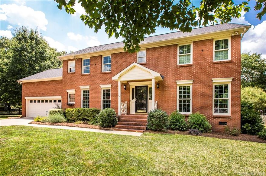 Beautiful, brick 2-story home on half-acre in established nhood! Popular schools, convenient location, beautiful landscaping, 2-car garage, relaxing screen porch, fenced yard & a pool! Newer roof & windows! Water htr 2016. Updated kitchen w beautiful quartz & a tile backsplash. Lots of hardwoods & new carpet. Updated master bath-with spa shower, garden tub and heated tile floor! 4 great size bedrooms PLUS a huge bonus room. Looking for a house? Come see this one & you will want to call it HOME!