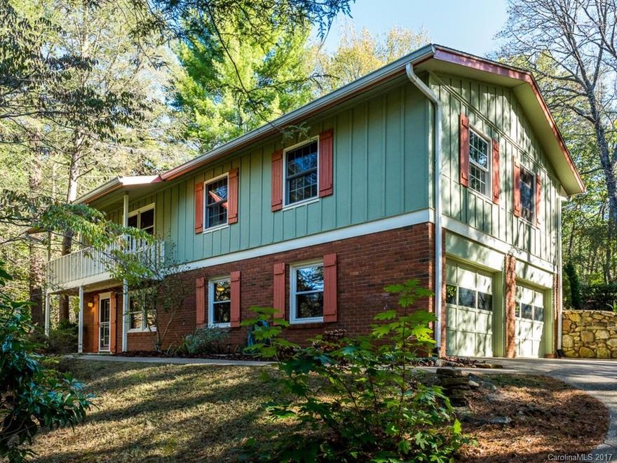 Immaculate and move-in-ready 3BR, 3BA home in desirable North Asheville/Beaverdam neighborhood.  Enjoy a spacious and fully fenced, level back yard with a private deck for an outdoor dining table. Outdoor shed includes electricity. The finished lower level with its full bath, wet bar and cork flooring has many possibilities for use from a great entertaining space to office to possible guest suite.  This home has been well maintained and is located conveniently to all Asheville has to offer.