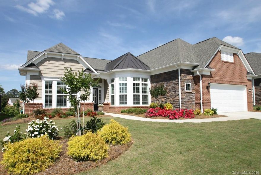 Gorgeous Cumberland Hall with Unbeatable Water Views! Custom Sunroom and Screen Porch Overlooking Private Backyard! Gourmet Kitchen Features Cherry Cabinets, Granite Countertops, Stainless Steel Appliances, Island and Breakfast Nook. Owner's Suite with Water Views, Private Bath and Walk-In Closet. Custom Paint and Trim Upgrades Throughout! Move In ready! Next to Golf Cart Path that will Lead to "The Lodge" - Sun City Carolina Lakes Second Amenity Center!