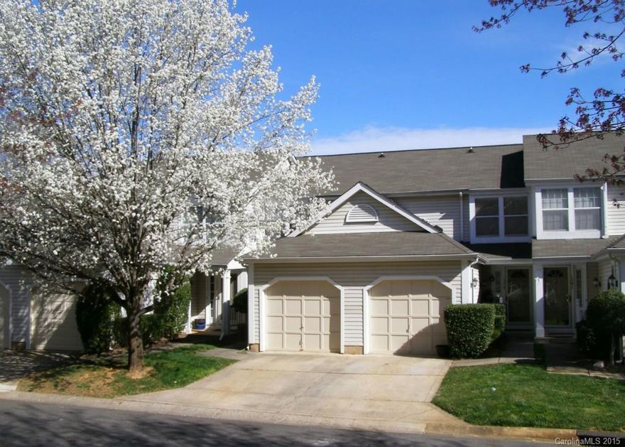 LOCATION! LOCATION! LOCATION! Quiet townhome community within walking distance to shops, restaurants, movies. Great unit boasts brand new carpet &  fresh paint throughout. New luxury vinyl flooring in foyer, Kitchen, half bath. Enter on main, open staircase allows views to large Living Rm. Sliders  to rear deck. Kitchen has pass thru/breakfast bar. Lower level Master or Den, full bath w/new flooring & lighting. Access to private rear patio. Upper level has 2 more BRs (one could be 2nd Master)