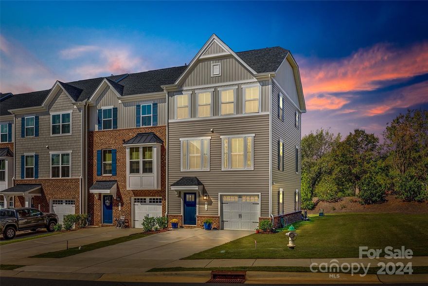 Looking for almost new & ready to move in? This amazing end unit, three-level townhouse has many updates & features with a great location. Main level has foyer with drop zone & extensively upgraded molding, half bath, bonus/flex space, lots of storage, extended 11x18 patio & 1 car finished garage. Second level has open concept space w/family room, half bath, kitchen featuring white soft close cabinets, island w/quartz countertops, pantry, stainless appliances & fridge to remain, dining area overlooking freshly waterproofed 12x10 deck. Third level has 3 bdrms, 2 full baths, & laundry. Additional upgrades include stairways w/rod iron railing, baths & laundry feature tile flooring, primary bedroom w/trey ceiling, primary bath w/seamless shower, and 2" blinds thru-out. Located in popular Regent Park w/all the amenities the neighborhood offers, plus building is positioned that you can't see other units from the windows & privacy in back yard. Survey ready if new owner wants to add a fence.