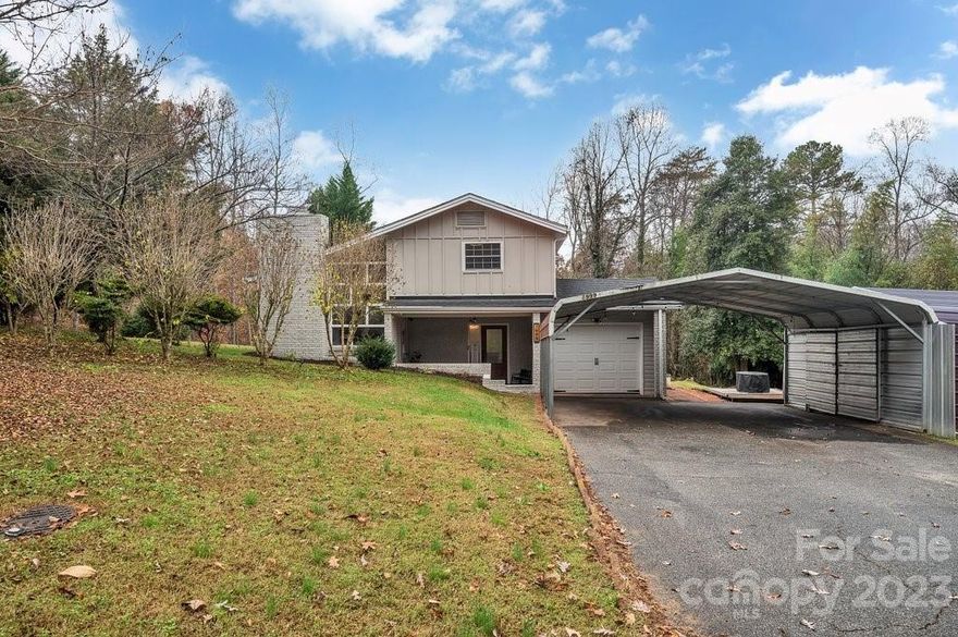 Explore the charm of this 3 bed/2.5 bath Tri-level home situated in the serene and friendly Forest Park Development. This home boosts modernization and character at every corner, and sits on a spacious almost 1-acre corner lot with majestic cypress trees for privacy. Enjoy the added perks of beautiful vaulted ceiling, open concept living, and the bottom floor barndoor style entry bonus room perfect for an office/flexspace. The kitchen features stainless steel appliances and granite countertops. Recent upgrades include refinished hardwood floors, updated kitchen and bathrooms, a new water heater (2022), roof (2021), HVAC system B (2021), and revamped crawl space insulation with new vapor barrier (2022). 

The driveway comfortably accommodates 7 vehicles. This property is convenient for accessing Hwy 321 and Hwy 16. Don't miss the opportunity to call this updated gem home!