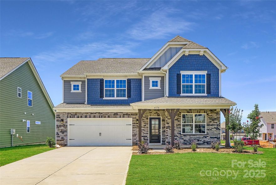 This Grisham is a two-story home that features an airy layout among a first-floor kitchen with a large center island, breakfast nook and family room that’s fit for modern times. The spacious guest suite enjoys privacy on the main floor with a convenient full-sized bathroom. A study replaces a living room. On the second floor is a large loft to provide additional shared living space surrounded by three restful bedrooms and an owner's suite. A two-car garage completes the home along with an unfinished basement. Plus, our signature Everything's Included program means you will get quartz or granite kitchen countertops, subway tile backsplash, ceramic tile, and luxury vinyl plank flooring at no extra cost! Welcome to Elizabeth, a sought-after master-planned community located in the heart of Fort Mill, offering 7 collections of new homes.