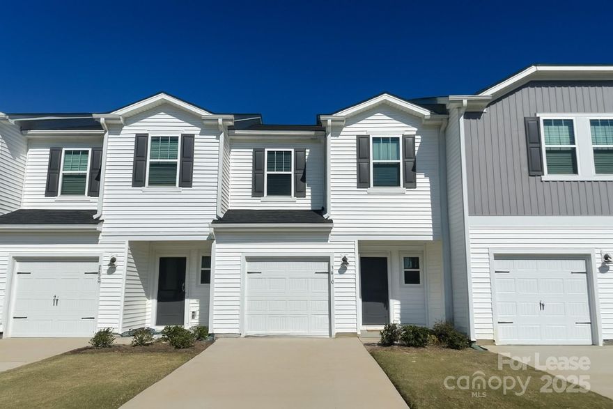 Experience modern comfort and style in this immaculate 3-bedroom, 2.5-bath townhouse nestled in the desirable Childers Park community. Step into an open-concept living area filled with natural light and a chef-inspired kitchen featuring a spacious island, walk-in pantry, and energy-efficient appliances. All bedrooms, including a private primary suite with a walk-in closet, are thoughtfully situated upstairs for privacy and convenience. Enjoy hardwood, carpet, tile, and vinyl flooring throughout, plus an attached garage and driveway parking. The community offers peace of mind with professional HOA management. Located near top-rated Concord schools, shopping, dining, and easy highway access, this pet-friendly home is ready for you to move in and make it yours!