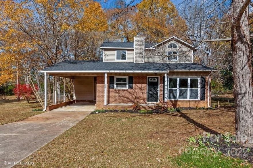 Beautiful home is move in ready!  Light, bright & airy floorplan.  NEW roof, NEW SS appliances, NEW floor coverings, NEW HVAC, NEW granite countertops in kichen, NEW spacious deck & more!   Greatroom boasts a soaring 2 story ceiling with brick FP. Freshly painted interior completes this lovely home.  Bedroom and full bath downstairs, primary BD, 3rd BD and bath up.