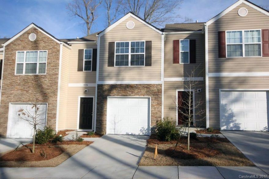 Why wait for new construction in the University area?  This 2016 2BR Coventry Townhome unit is barely lived in and ready now!  Convenient to I-485 and everything in the UNCC/University area.  Popular Maywood plan with open kitchen and living area, second floor features the optional enhanced master suite (20’ x 11’ 10”!) and split plan w/large 2nd bedroom.  Refrigerator, washer & dryer included, just bring clothes and furniture!