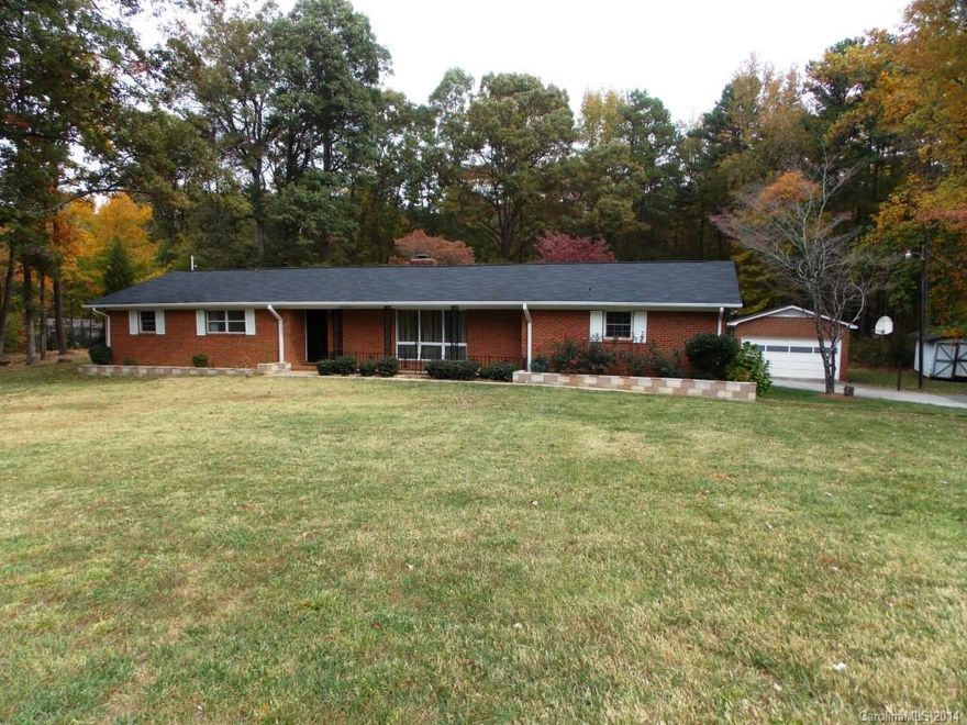 Wonderful Full Brick Ranch Style Home on 1.83 Acres in Private & Quiet area of Huntersville but close enough to all the conveniences and commute to Charlotte.  Maintained well with features of Neutral colors, Woodburning FP, Wood Beams in Family & Dining Room area, Ht/AC Sunroom, Built-in Shelving, Office, Double Ovens, Pantry Whirlpool Tub, Chair Railing, New Roof, New Flooring & Carpet, New Countertops, Updated Light fixtures, New Windows, Lg Storage Laundry Rm, Pool, Large Patio, 2car Garage.