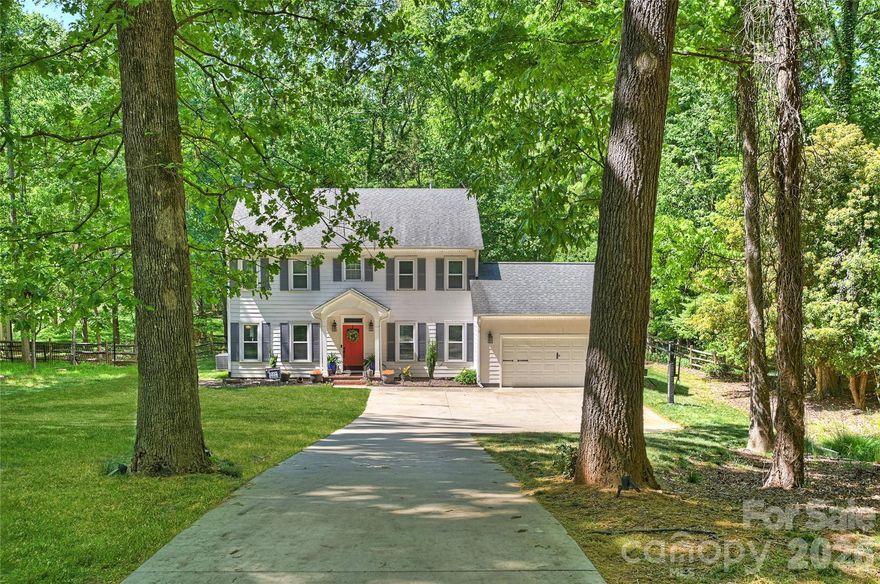 Showings offered one weekend only, 5/2–5/3. Set back from the road on a private .45-acre lot, this is the kind of setting buyers hope for in Providence Plantation—but rarely find.

5525 Lancelot Drive stands apart for one simple reason: it’s already been done. Comprehensively renovated in 2017, the home blends the established character of Providence Plantation with the level of finish and functionality today’s buyers don’t want to take on themselves.

The main living space is designed to feel open, connected, and easy to live in—anchored by a coffered ceiling great room that flows naturally into the kitchen and breakfast area. At the center, a large quartz island creates a true gathering space, supported by professional-series stainless appliances, gas cooking, double wall ovens, and a walk-in pantry.

Formal living and dining rooms offer flexibility for entertaining, working from home, or adapting to the way you live—without sacrificing flow. Natural light carries through the breakfast area and into the private backyard, reinforcing the home’s connection to its setting.

Upstairs, the primary suite delivers a comfortable, well-designed retreat with dual vanities, a walk-in shower, and two closets, including a walk-in. Secondary bedrooms are well-proportioned and flexible for guests, office space, or everyday living.

Out back, the deck and patio open to a deep, private yard—quiet, usable, and ready for whatever comes next.

Located in one of South Charlotte’s most established neighborhoods, Providence Plantation offers top-rated schools and convenient access to Waverly, Rea Farms, the Arboretum, and I-485. Optional membership to the Providence Plantation Swim & Racquet Club adds to the lifestyle.

Opportunities like this—updated, well-positioned, and move-in ready—don’t come around often in Providence Plantation.
