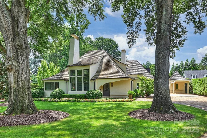 Welcome to your own private resort! One-of-a-kind custom home designed by acclaimed architect Ken Pursley and perfectly positioned in the heart of Foxcroft. Extraordinary craftsmanship and architectural detail are evident throughout sophisticated formal and relaxed living spaces—ideal for intimate gatherings or large-scale entertaining. The main level features a stunning family room with vaulted brick archways, a designer kitchen with scullery, two private offices, and a serene primary suite with spa-inspired bath. Four secondary ensuite bedrooms and a stylish lounge complete the upper level. The fully finished basement boasts an impressive bar, billiards area, media room, fitness room, and temperature-controlled wine room. Seamless indoor-outdoor living unfolds across expansive covered and open terraces with outdoor kitchen, gas firepit, and views of the resort-style saltwater pool and spa, complemented by a pool cabana with fireplace and bath. Elevator to all floors, generator, dog wash, and abundant storage. A truly unmatched luxury lifestyle in one of Charlotte’s most prestigious neighborhoods.