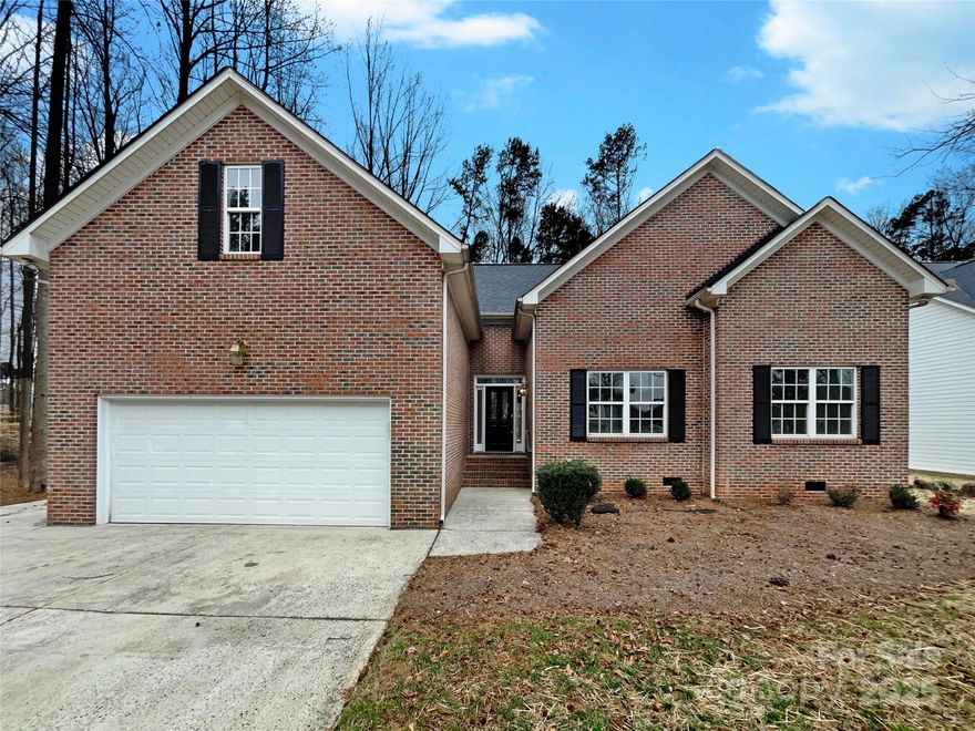 Seller may consider buyer concessions if made in an offer. Check out this stunner! A fireplace and a soft neutral color palette create a solid blank canvas for the living area. You won’t want to leave the serene primary suite, the perfect space to relax.  Take advantage of the extended counter space in the primary bathroom complete with double sinks and under sink storage. The back yard is the perfect spot to kick back with the included sitting area. Don't miss this incredible opportunity.