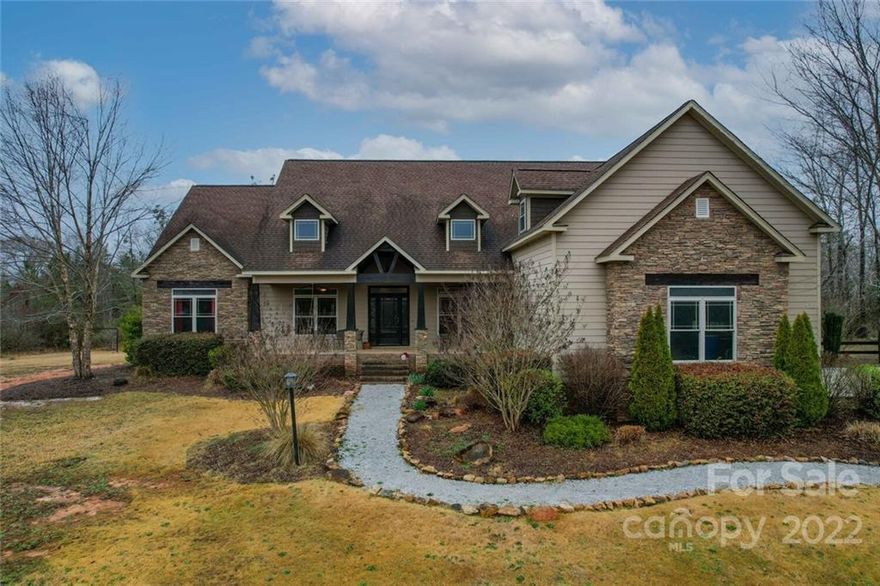 This gorgeous custom craftsman home offers the ultimate in private rural living. Situated on 194 acres this 4 bedroom 3.5 bath home is a sportsman's paradise for hunting and fishing. Home features heart of pine throughout. Chef's kitchen included Thermador appliances, double wall oven, pantry, built in refrigerator/freezer, trash compactor, custom Alderwood cabinetry, and two islands. The kitchen opens into the guest room with cathedral ceiling complete with exposed beams and a gas fireplace. There is a second gas fireplace in the living room and a third on the covered back patio. The master bedroom features two closet spaces and a luxury bathroom complete with separate vanities, double entry walk in shower with numerous shower heads. Upstairs has 749 finished square feet and additional 2519 unfinished that is framed/wired/plumbed. Too many features to list! This 41 acres is a suggested split from total 194 acres.