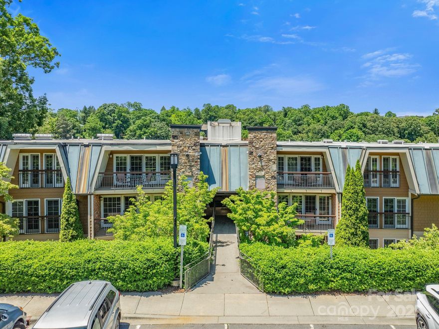 Uncover the perfect blend of style, convenience, and investment potential in this 3 bed/2 bath condo at Lantern Lodge (formerly The Residences at Biltmore), All Suite hotel. Ideally situated between Biltmore Village and downtown Asheville, this fully legal short-term-vacation-rental is a rare find. Amenities include a pool, hot tub, fitness center, on-site restaurant, conference rooms, and event space. This is truly a home away from home, complete with full kitchen, granite countertops, walk-in shower, gas fireplace, private balcony, and the 24 hour concierge provides a complimentary laundry service. All furniture, linens, and kitchenware are included. Owners enjoy turnkey property management services if they choose to put their condo in the rental program. Rental history is available upon request.