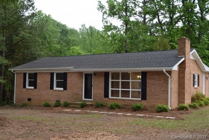 Bring your ATVs and animals and let the adventures begin on this 8 acre lot!!! This lovely all brick ranch has all the right upgrades.  Freshly renovated, new carpet, tile flooring, newer HVAC system.  Kitchen has all new cabinetry,  new granite counter tops, tile back splash, and brand new stainless steel appliances.  Roof replaced in 2016 with 30 yr architectural shingles.  Detached 36x30 wired building has 3 garage bays and an office.