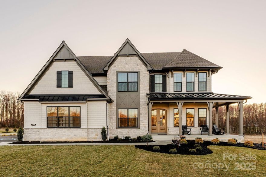 Welcome to The Gables at Handsmill Waterfront, a rare opportunity to own one of 11 exclusive, potentially dock-able homesites on Lake Wylie. Each homesite is designed for a walkout basement and showcases sweeping, picturesque views of the water. With direct lake access, everyday life feels like a retreat. Launch a kayak from your backyard, practice paddleboard yoga just steps from your home, or take a refreshing swim on a warm afternoon. This is lakefront living at its finest, waiting for you at The Gables at Handsmill Waterfront.

The Devonshire is a 4+ bed, 2.5+ bath home featuring an open floorplan, 2 staircases, and many unique customization options. Inside the Foyer, there is a Living Room to one side and Dining Room to the other. In the main living area, the 2-story Family Room opens to the Kitchen with large eat-in island. Private Study near back stairs can be used as optional 5th bedroom. Upstairs, the spacious Owner's Suite has 2 walk-in closets and a private full bath. Bedroom 2, 3, & 4 share a hallway bath. Laundry Room is conveniently located on the same floor as all bedrooms. The Devonshire can be customized to include up to 7 Bedrooms and 8.5 Bathrooms.

See also: 4296945 & 4296936