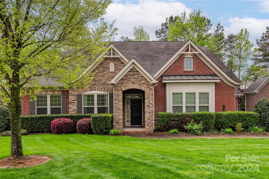 Don't miss this beautiful, exceptionally maintained, full brick, 1.5 story home on a quiet street in Barber Rock.  This popular floor plan features a Living Room/Office as you enter. The kitchen has a large center island and is open to the Great Room w/stone fireplace, Dining Room and Breakfast area with extensive windows. Completing the main level is the Primary Suite with large walk-in closet, dual vanity and separate tub and shower, Mud/Laundry Room and two additional Bedrooms and a full Bath. Sliding glass doors in the Breakfast area provide direct access to the covered rear porch and serene paved patio area. Upstairs are two additional Bedrooms (or a Bedroom and Bonus room) and a full Bath. There is an abundance of closet space and access to attic storage. This yard has also been meticulously maintained and offers full irrigation; front and back.  The Barber Rock community offers a club house, outdoor pool and playground for it's residents enjoyment.