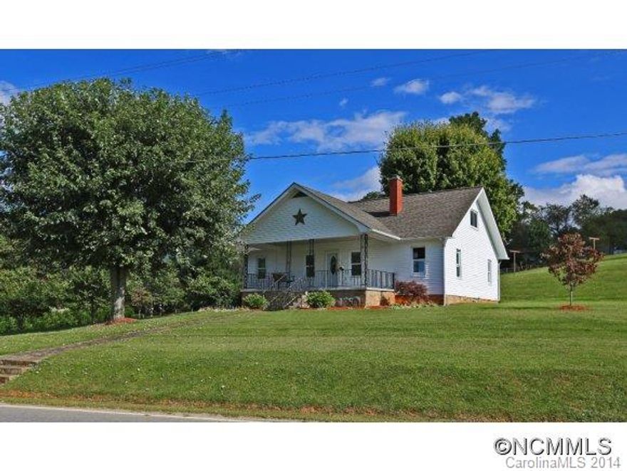 Totally Updated 1940âs farmhouse w/ beautiful country setting & surrounding mountain views. This Pristine & move in ready Home features 3-bedrooms,1 bath,living room,wood burning fireplace,refinished wood floors,dining open to kitchen,laundry on main level,full unfinished basement,covered front porch & year round access.Convenient to Downtown Waynesville.Property taxes to be determined.Includes Portion of pin # 8625-18-2099 to be surveyed.