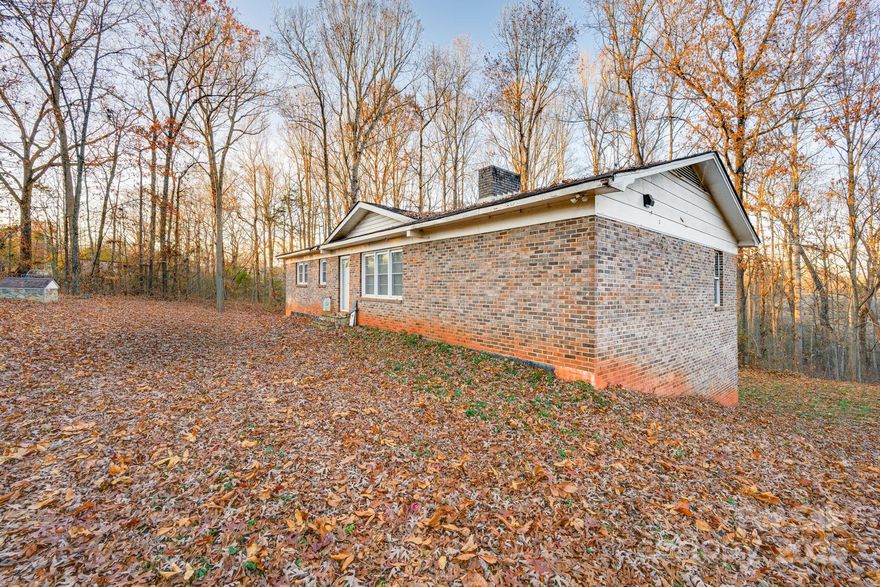 Discover comfort and privacy in this all-brick home set on 1.5 peaceful acres. This 3-bedroom, 2-bath property features LVP and tile flooring throughout, plus a beautiful stone fireplace that creates a warm centerpiece in the living room. The durable brick construction and thoughtful layout make this home both inviting and easy to maintain.

The unfinished basement offers excellent potential for future expansion—ideal for storage, a workshop, or custom living space. Surrounded by nature yet convenient to local amenities, this property is a great fit for buyers seeking a private setting and room to grow.