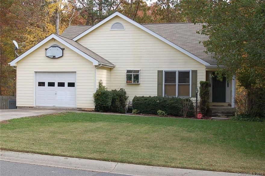 Spacious home in desirable Palmetto Plantation! Main floor great room with vaulted ceiling and gas fireplace. Cozy eat in kitchen with great natural light. Master suite with garden tub. Second bedroom across from full hall bath. Fully finished basement with second living quarters! Large recreation room, two bedrooms, bonus room with closet and partial kitchen. Perfect space for an in-law or guest suite. Enjoy a relaxing evening on the deck overlooking the fenced yard backing to a wooded area.