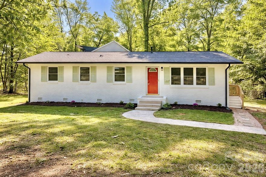 Completely renovated brick home with modern designer finishes and a move in ready feel. This inviting home features an open floorplan, a stunning electric fireplace, and a spacious kitchen with luxury tile, a large island, and an impressive dining area perfect for everyday living or entertaining.

Both bathrooms have been beautifully updated with upscale tile finishes. Situated on a private corner lot, the property offers a large fenced yard while still being close to shopping, dining, highways, and everything Charlotte has to offer. Stylish, spacious, and full of new upgrades, this home truly feels like home.