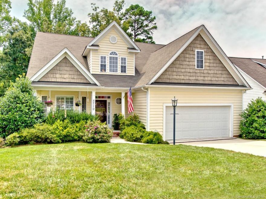 CUTE!  In great condition; great curb appeal; quite & private. Open Floor plan; light and bright.  Vaulted ceilings.  Hardwoods on main level, stairs & 2nd floor hallway. Plantation Shutters throughout. Eat -in Kitchen has granite and SS appliances.  Master bedroom on main level; separate garden tub, ceramic tile floor.  Formal Dining/Living can be used as office, has double glass French doors; Upstairs bath has double vanities; 2 spacious bedrooms and large bonus room.  Backs to woods-peaceful.