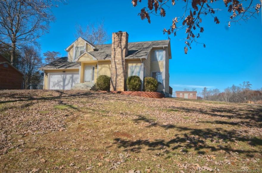 Enjoy tranquil, beautiful sunrise views from this hilltop home in the mornings, grilling out with friends and family on the sprawling deck on the weekends or relaxing in the hot tub after a hard day. Inside you can spend evenings hanging out in the family room by the fireplace or entertaining in the large kitchen and dining room areas. This one is move in ready and priced to sell!