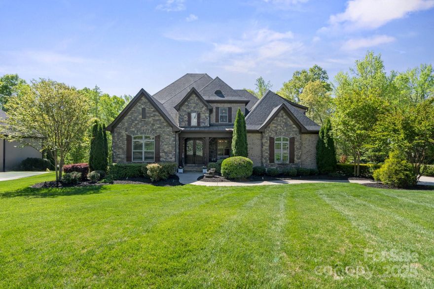 YOUR SUMMER OASIS AWAITS! THIS GORGEOUS CUSTOM HOME HAS FABULOUS UPGRADES AND FEATURES- HEATED SALT WATER POOL THAT INCLUDES BUILT IN SPA AND SUN SHELF- OUTDOOR FIRE PIT- EXPANSIVE PATIO AREA FOR OUTDOOR ENTERTAINMENT- SCREENED IN PORCH TO ESCAPE THE HEAT- KITCHEN HAS 6 BURNER GAS RANGE WITH DUAL OVENS AND GRIDDLE- 2 SINKS, 2 DISPOSALS, GRANITE COUNTERTOPS, STONE BACKSPLASH, PREP ISLAND- GREAT ROOM FEATURES STONE FIREPLACE WITH GAS LOGS BEAUTIFUL COFFERED CEILINGS- OWNERS RETREAT INCLUDES PRIVATE PORCH ENTRY- PLANTATION SHUTTERS- BATH W/DUAL VANITIES, GARDEN TUB, TILE SHOWER- LARGE WALK IN CLOSET- UPPER LEVEL BOAST SPACIOUS MEDIA ROOM AND A BONUS ROOM- WALK IN ATTIC STORAGE- 3 BEDROOMS- 2 FULL BATHS- 2 TANKLESS HOT WATER HEATERS-  BAR WITH BEVERAGE FRIDGE- 3 CAR GARAGE- IRRIGATION- MANICURED LANDSCAPING- WALKING TRAILS- LOCATED CLOSE TO THE DAVIDSON GREENWAY, RESTAURANTS, SHOPPING, COLLEGE, AND PICTURESQUE DOWNTOWN. THIS IS A DEFINITE MUST SEE!!