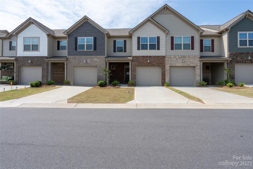 Welcome Home! This 3-bedroom, 2.1-bathroom townhouse presents a picture-perfect home with its light-and-bright rooms, gorgeous contemporary style, and elegant floor plan that offers space for everyone. Beautifully maintained, the property comes move-in ready. Beyond the charming front porch and the foyer, the open-plan dining and family room forms the heart of the home with endless space to relax, stretch out, move and entertain. The overlooking kitchen comes ready for the home cook with its modern stainless-steel appliances, timeless traditional cabinetry, and corner pantry, and when summer rolls around, the screened-in porch presents the perfect spot for alfresco dining and lounging. All the bedrooms sit upstairs and come comfortably sized, with the primary maintaining that extra deluxe touch with its private ensuite and walk-in closet. The garage and driveway provide plentiful parking, and there are fantastic everyday amenities just around the corner.