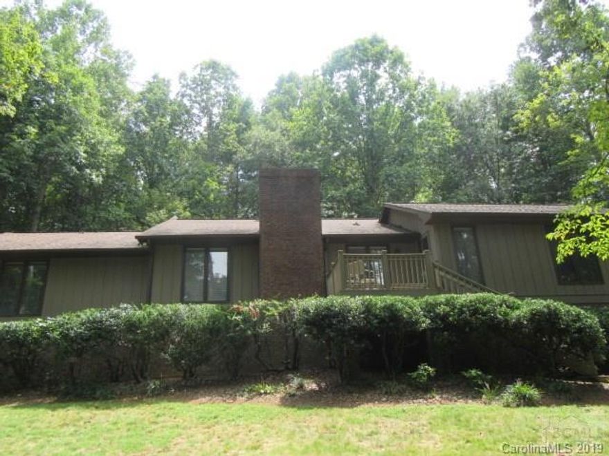 WELL MAINTAINED 4BD 3 BA home in the desirable Highland Park subdivision. This home has a wonderful split bedroom floor plan , SPACIOUS living room with GRAND stone gas fireplace, formal dining room, kitchen with breakfast area with skylight that provides lots of natural light, LARGE master suite and en suite bath,walk in closet with built in shelving , laundry room on the main level  and 12 x 21 screened in porch for enjoying your morning coffee or added space for entertaining!!! Downstairs there is a 4th bedroom that is currently being used as an office, built in shelves,  easy access to downstairs bath and outside entrance from this room.Double garage with sink and tons of storage....central vacuum !!! All this and a beautiful landscaped 0.98 lot!!! Close to downtown Morganton and Lake James. Priced at $254,900