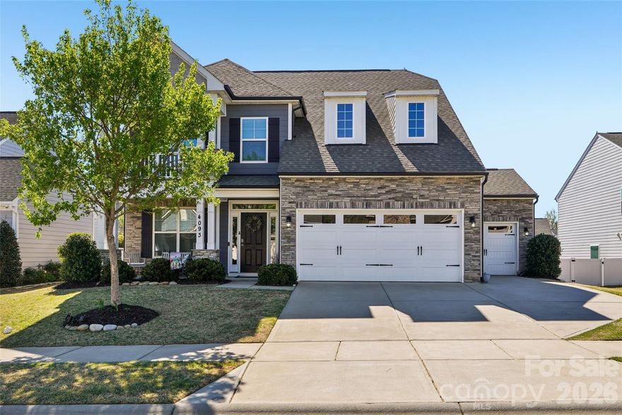 Welcome to this beautifully designed three-story home in a well-appointed Walnut Creek neighborhood, known for its charm and great amenities. The main floor greets you with bright, open spaces and elegant new flooring. The kitchen is a chef’s dream, featuring a double oven, a gas cooktop, and a convenient pot filler. A formal dining room sits nearby, along with a pantry for extra storage. The cozy fireplace anchors the living area, making it warm and inviting. This floor also includes a guest bedroom and a full bath, plus access to the screened patio, where roll-down shades provide the perfect balance of privacy and outdoor comfort. On the second floor, you’ll find the spacious primary suite, a true retreat, with elegant tray ceilings, a spa-like bath featuring a large walk-in shower, and a walk-in closet. Two additional secondary bedrooms and a full bath are also on this level, along with a bright loft space that can serve as a home office or second living area. The laundry room is conveniently located here as well, and you can step out onto the private balcony porch for a quiet outdoor retreat. On the third floor, you’ll discover a private guest suite, offering a full bath and a versatile layout, perfect for visitors or a private home office. This flexible top-level space gives you the privacy and comfort your guests will love, rounding out this thoughtfully designed home. In addition to its thoughtfully designed interiors, this home also boasts a three-car garage, providing plenty of space for vehicles, storage, or a workshop. The fenced yard is a true oasis, featuring a fire pit and a patio with a cozy sitting wall—ideal for evenings outdoors or gatherings with friends and family. This well-rounded home truly offers a perfect blend of comfort, versatility, and outdoor enjoyment. Beyond the home, Walnut Creek residents enjoy a range of amenities designed for an active lifestyle. The community features a clubhouse, a junior-Olympic pool, and a fitness center, offering countless ways to stay active and connected. Walnut Creek Park includes a sports complex with lighted fields for baseball, softball, and soccer. Nearby, Henry S. Nesbitt Park adds even more value with a walking track and direct access to the Carolina Thread Trail—ideal for outdoor recreation. Conveniently located near adorable downtown Waxhaw, bustling Ballantyne, and major employers, this home offers a thoughtful blend of comfort, convenience, and lifestyle.