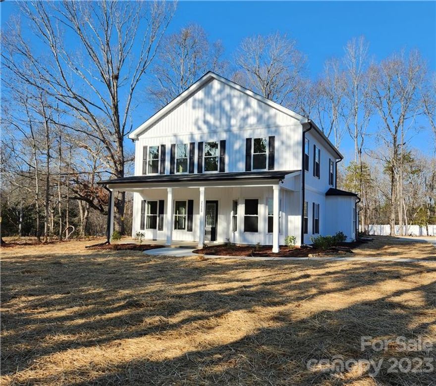 Back on the market at no fault of the Seller.  Exquisite Farmhouse Style New Construction with space for all of your needs. Entire Main Floor has beautiful hardwoods.  Primary Bedroom on Main with Soaking Tub and Separate Shower. Front room with bay window, and closet, can be used as a Dining Room, Office or even a Bedroom. Beautiful kitchen with granite counter tops, soft close drawers and cabinets and walk-in pantry.  Stainless appliances including a refrigerator.  Large Laundry Room on main level with cabinets.  Under stair storage.  Upstairs has 3 additional bedrooms and another space for an office, bonus, or whatever you choose.  Walk-in attic storage and well insulated. Covered Patio access from Primary BR and Living Areas. Large 2 car side load garage. Wooded lot. The house sits back off of the road and has pine trees lining the front on the property.  Private setting. Easy access to 521 and a back way to Rock Hill.