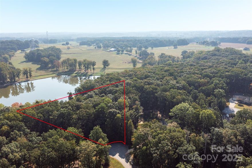 Build Your Dream Home in Fifth Creek Estates!

Welcome to 157 Poplar Leaf Lane, a beautiful residential lot nestled in the desirable Fifth Creek Estates subdivision of Statesville, NC. This spacious cul-de-sac homesite offers both privacy and charm, with a serene, wooded backdrop, and a nearby water view that adds to the natural beauty of the setting.

With a generous lot size of .85, this property provides plenty of space to design and build the home you’ve always envisioned. Situated near Mocksville Highway (US-64), you’ll enjoy convenient access to shopping, dining, schools, and healthcare while still being surrounded by the tranquility of nature.

The community is bordered by Fifth Creek and includes scenic views, winding roads, and a welcoming neighborhood feel—perfect for those seeking a balance of peaceful living with easy access to modern amenities.

Highlights:

-Spacious cul-de-sac lot with privacy

-Located in Fifth Creek Estates subdivision

-Wooded surroundings with a natural, tranquil setting

-Nearby water view adds to the lot’s appeal

-Ready for your custom home build

-Convenient to I-40, I-77, and Statesville’s local amenities

This is the ideal opportunity to bring your dream home to life in one of Statesville’s most charming communities. Don’t miss it!