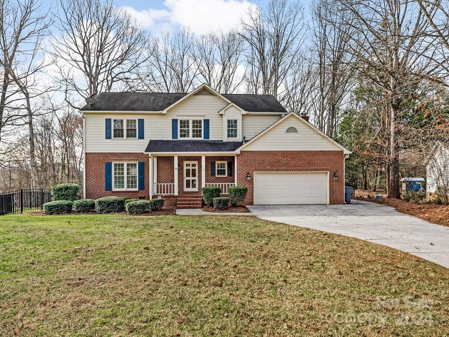 Welcome to this bright and sunny home with views of the Raintree golf course! This 4 bedroom 2.5 bathroom home has something for everyone. This open floorplan has multiple living spaces downstairs great for entertaining or just being home. Both floors have brand new carpet. Kitchen has tons of cabinetry with great storage, an island, granite countertops and is open to the cozy den with brick mantle and gas logs fireplace. The 3 season porch off this area will live up to its name and be used all year round. A convenient main floor laundry room and attached garage are also highlights of the main floor. Upstairs you will find 4 nice sized bedrooms including the primary suite with a large walk in closet. There is also walk in attic storage on this floor. The house sits in a cul de sac in a convenient location just minutes away from the Arboretum, shopping, and restaurants.