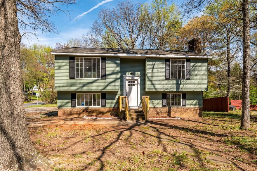 Completely renovated home on large corner lot! Open floor plan with new LVP flooring throughout. Lovely kitchen featuring new white cabinets, granite countertops and stainless steel appliances. Both bathrooms have been updated with new vanities, lighting, fixtures and beautiful subway tiled showers. Lower level has two bedrooms and a full bath plus 2nd living space/bonus room.  Large deck off the living room for grilling/entertaining. Extra wide double driveway. Large laundry/mudroom. New Roof- 2022. No neighborhood HOA!