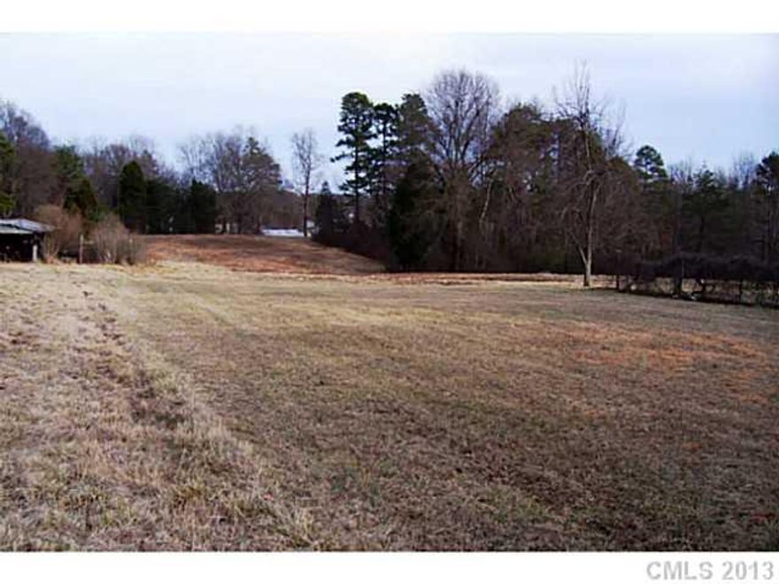 Desirable location with huge potential on the Highway 21 corridor. Located only 2.5 miles from I77 exit 33 and the hospital area; only 1.8 miles from I77 exit 36 and all the shopping areas; only 1.4 miles from the new I77 exit 35. Great access to Lake Norman, Mooresville, Charlotte, etc. There is a 3 BR 2 BA house on the property.