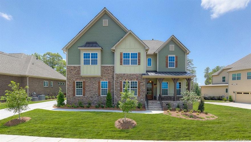 This much sought after home called "The Kathryn" has 5 Bedrooms, 4.5 Baths, Study, Bonus rm. & Screen Porch  sits on 1/3 acre as you approach a cul-de-sac. Unique Garage layout: 2 car garage w/ 242 sq. ft. of Additional  Garage Storage Space for toys or golf cart. Spacious Guest suite on main with a full bath. 10 ft ceilings on 1st fl. with tons of hardwoods on the 1st floor main & 8ft interior doors. Tankless water heater, fully sodded & irrigated yards are all included features in this home!