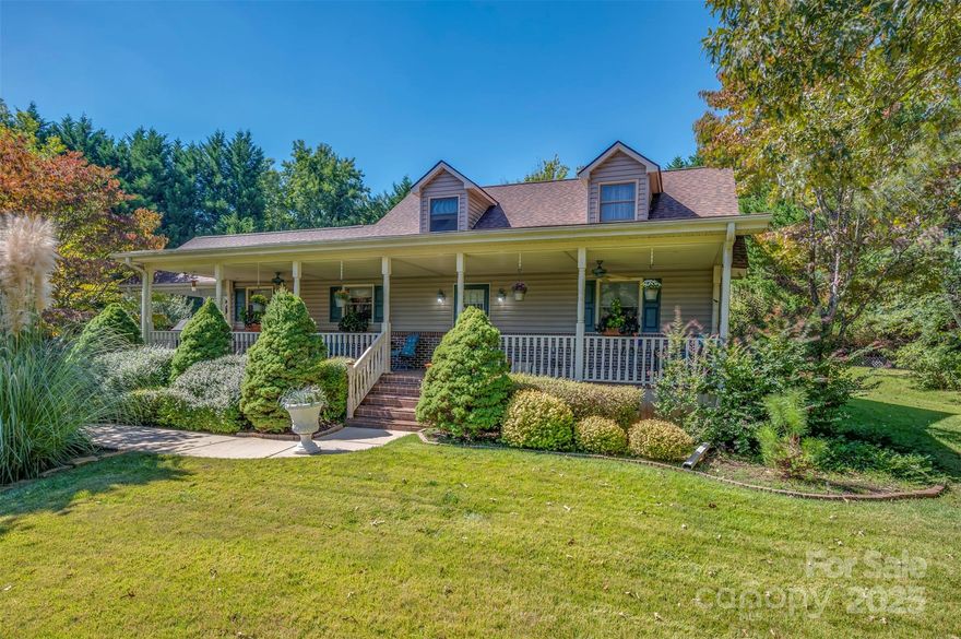 SELLER IS OFFERING TO PURCHASE TWO POINTS TOWARDS A MORTGAGE RATE BUYDOWN.
Welcome to your charming Cape Cod-style retreat nestled in a private setting in Tryon, NC! This spacious 3-bedroom, 2-bathroom home boasts 2,058 square feet of comfortable living space, complete with a gorgeous wrap-around front porch perfect for sipping your morning coffee. Enjoy the sunroom and bonus room that can easily serve as an office or play area, while the detached garage and hobby/work shed provide all the storage you need. Set on well-maintained grounds, this easy-to-care-for property is just a stone's throw from Tryon and Columbus, making it an ideal spot for those who want convenience without sacrificing privacy. Come see how this lovely home can be your peaceful sanctuary!