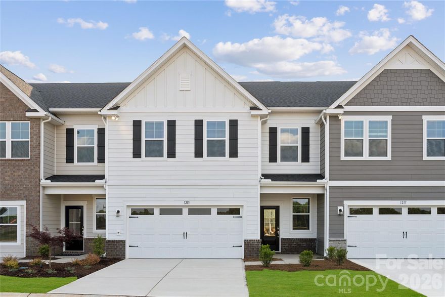 Welcome home to this stunning townhome in Fort Mill, offering 2,448 sq. ft. of beautifully designed living space with the perfect blend of comfort and style. Located just off Interstate 77, this community provides convenient access to Kingsley, historic downtown Fort Mill, and some of the area’s best shopping, restaurants, and entertainment.

Step inside to discover a bright, modern interior featuring upgraded cabinetry, gorgeous quartz countertops throughout the kitchen and baths, and oak stair treads that add an elevated designer touch.

Designed with everyday living in mind, this spacious home includes 3 bedrooms, 2.5 bathrooms, an upstairs flex space, and a tucked-away pocket office on the main level—perfect for working from home or added versatility. Unwind on the covered rear porch and enjoy the convenience of a large 2-car garage, all while experiencing the ease of low-maintenance townhome living with the feel of a single-family home. Schedule your tour today!
