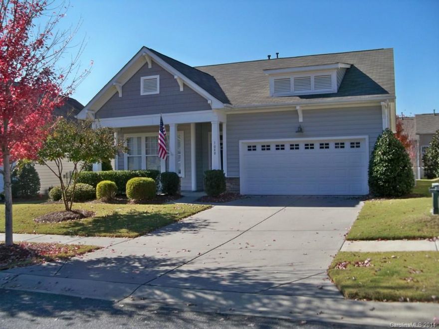 Like new condition with beautiful hardwoods, arched openings, high ceilings, abundant natural light.  Fabulous kitchen for the entertaining chef w/gas cooktop & double ovens. Formal Dining Room, Breakfast Room, Master suite on main, Large bonus/3rd bedroom with full bath on upper level. Oversized patio & SCREENED PORCH for outdoor enjoyment. Low HOA fees and NO YARD WORK.  Excellent location close to I-77,  airport, and downtown Charlotte.