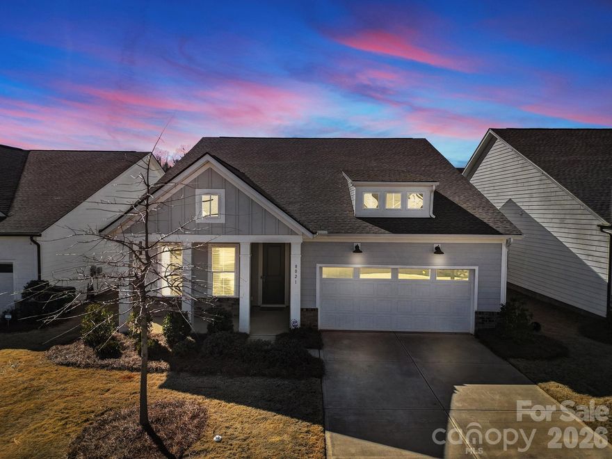 Welcome to the highly desirable Griffith Lakes Community- a lakeside neighborhood designed for both relaxation and connection. This luxurious ranch home offers the ease of one-level living with yard maintenance included, giving you more time to enjoy the lifestyle you deserve. Step inside to an inviting open floor plan featuring durable luxury vinyl plank flooring throughout the main living areas and kitchen. The heart of the home is a stunning chef’s kitchen complete with stainless steel appliances, a gas cooktop, granite countertops, tile backsplash, a large center island perfect for gathering, and a spacious walk-in pantry. The private primary suite is a true retreat, offering a generous walk-in closet, double vanities, and a beautifully designed walk-in shower. Two additional bedrooms provide comfortable accommodations and share a well-appointed bath with a walk-in tile shower. A large laundry room adds convenience and functionality to everyday living.  Enjoy the covered back patio for additional entertaining space. Exciting resort-style amenities are projected for completion in 2026 and will elevate the community experience even further — including a clubhouse, fitness center, outdoor pool with cabanas, hot tub, pickleball and tennis courts, bocce ball, grilling areas, and cozy firepits. Enjoy low-maintenance living in a scenic lakeside setting with future amenities designed to bring neighbors together. This is more than a home — it’s a lifestyle.